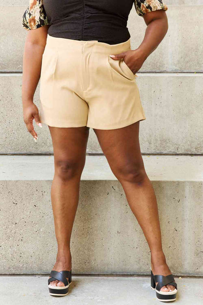 "And The Why" Every Little Thing Full Size Pleated High Waisted Shorts in Sand